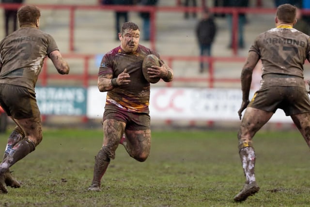 York duo Jordan Thompson and Danny Kirmond prepare to stop this Batley attack. Picture: Neville Wright