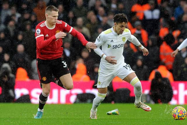Leeds United goal scorer Rodrigo gets ahead of Manchester United's Scott McTominay.