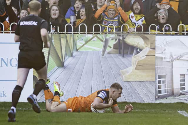 Greg Eden dives over for one of his three tries for Castleford Tigers against Hull FC.
Picture: Allan McKenzie/SWpix.com