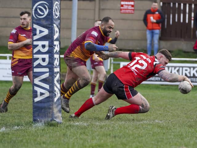 Ash Haynes about to go over for a try for Normanton Knights against Wigan St Judes in their first game of the new season in the National Conference League. Picture: Scott Merrylees