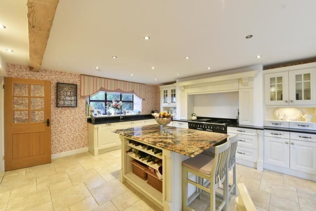 The central island is a feature of this recently installed, bespoke kitchen.