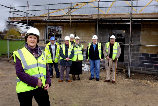 Sports mad residents in Ackworth celebrated a milestone in a project to build a £270,000 pavilion for teams in the village. A topping out ceremony saw Ackworth Parish Council clerk Sue Templeman on site.