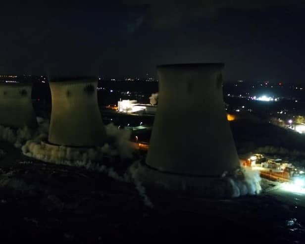 The cooling towers during the demolition.