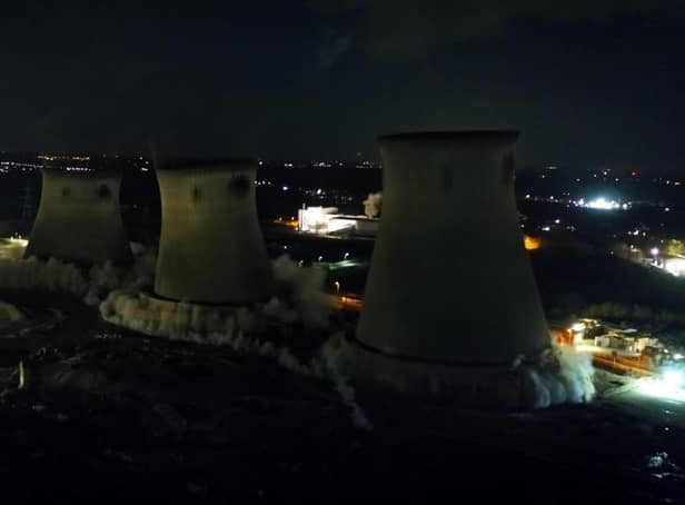 The cooling towers during the demolition.