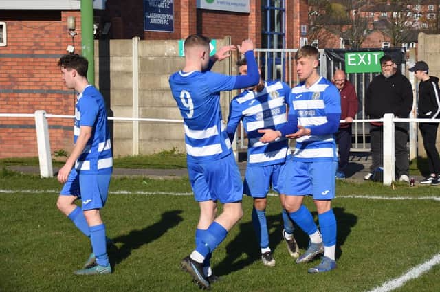 Jack Appleyard (number nine) celebrates Glasshoughton Welfare's goal against Nostell MW with scorer Lewis Stephens. Picture: Rob Hare