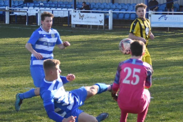 Goalkeeper Adam Greenwood comes out to deny Glasshoughton. Picture: Rob Hare