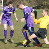 Wakefield Sunday League action sees Frickley Colliery (in lilac) taking on Nostell MW Sunday, who ran out 2-0 winners in Premiership One. Picture: Angie Breen