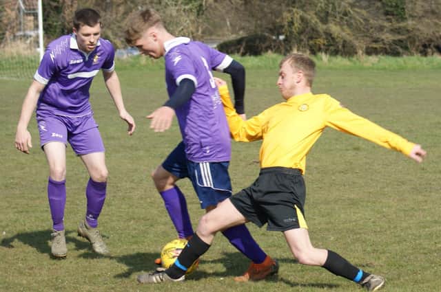 Wakefield Sunday League action sees Frickley Colliery (in lilac) taking on Nostell MW Sunday, who ran out 2-0 winners in Premiership One. Picture: Angie Breen