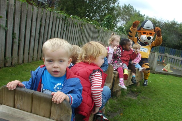 Castleford Tigers mascot JT at Brambly Hedge Day Nursery, Castleford. William Jackson is at the front of the train.