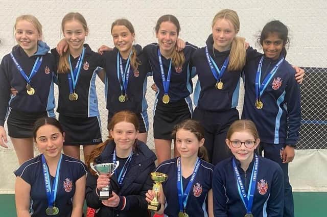 Trophy-winning Wakefield Girls' High School U13s cricket team.