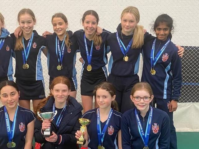Trophy-winning Wakefield Girls' High School U13s cricket team.