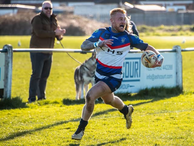 Taylor Martin races away to collect his hat-trick try for Sharlston Rovers in their BARLA National Cup semi-final at West Hull. Picture: Jonathan Buck