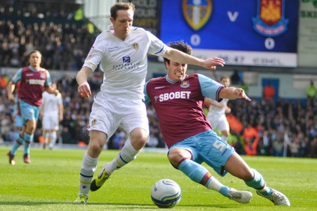 Aidan White take on James Tomkins in Leeds United's draw with West Ham that was followed up by a 7-3 humbling against Nottingham Forest that manager Neil Warnock admitted was "embarrassing".