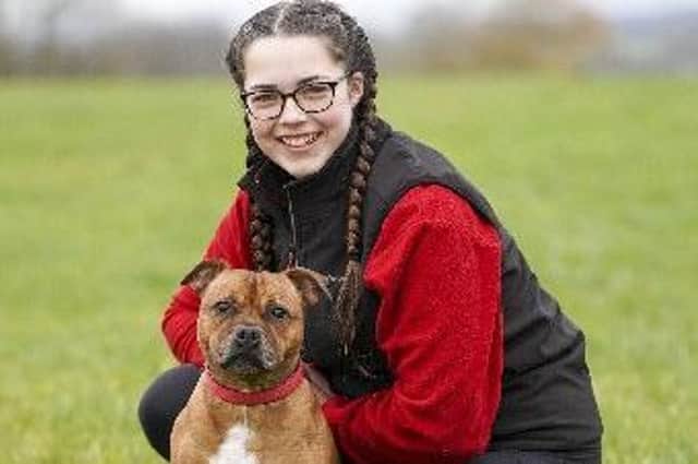 Abbie Spink and her Staffordshire Bull Terrier Buddy