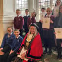 Children from six Pontefract schools met the mayor of Wakefield who presented them with an award for their fundraising efforts