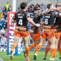 Tigers' celebrate after a try from George Laaler, right. Picture by Allan McKenzie/SWpix.com.