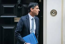 Nearly 30 million UK workers will see their taxes cut following Chancellor Rishi Sunak's raising of the NI earnings threshold, though a think tank said over 1 million Britons will be on the verge of "absolute poverty" due to the rising cost of living.