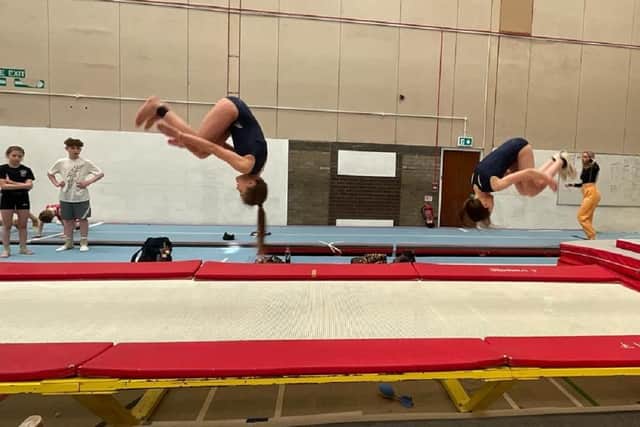 Wakefield Gym Club duo Rose Justice and Lucy Griffiths in tumbling action.