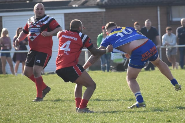 A Dudley Hill prop forward is dealt with. Picture: Rob Hare
