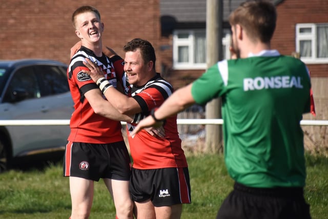 Charlie Barker congratulated on scoring his try. Picture: Rob Hare
