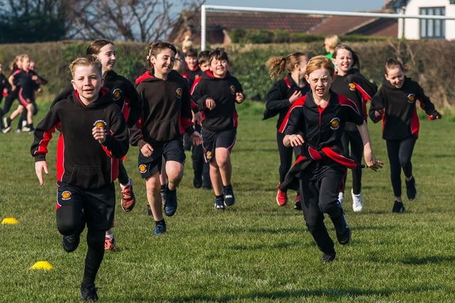 Determination on the faces of the youngsters as they take part in the 1k race at Southdale Junior School in Ossett