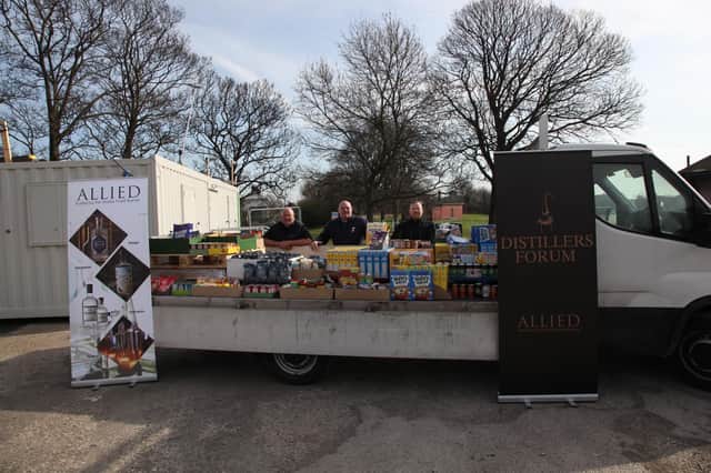 Staff from Allied Glass in Knottingley with the collection of food for Kellingley Community Hub's foodbank