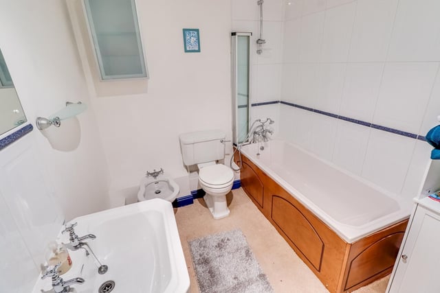A main bathroom includes a bidet within its suite.