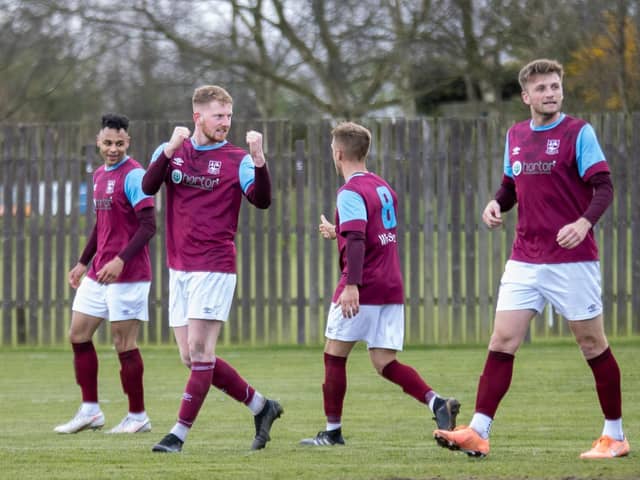 George Doyle celebrates scoring one of his two goals against Winterton Rangers with teammates Callum Charlton, Joe Kenny and Joe Jagger. Picture: Mark Parsons