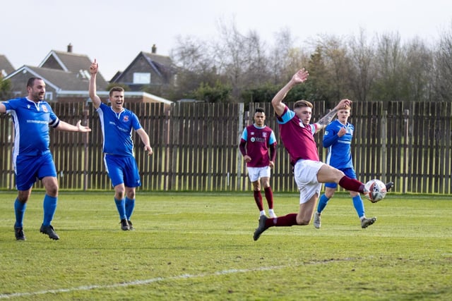 Sam Pashley stretches to shoot home, but Winterton appeals are answered as he is given offside. Picture: Mark Parsons