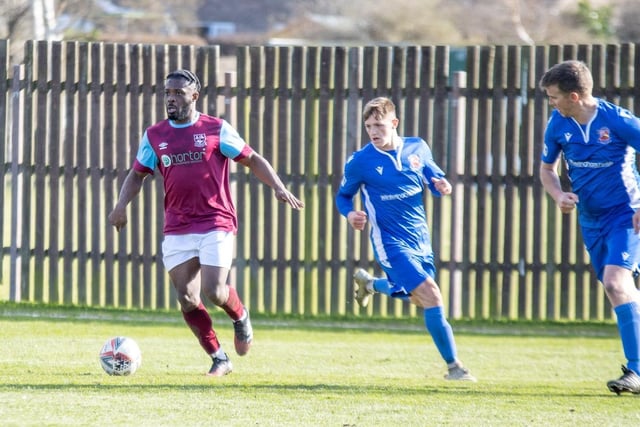 James Ngoe looks to get Emley on the attack. Picture: Mark Parsons
