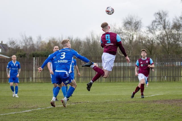 George Doyle gets up high to try to get his head to a cross into the area. Picture: Mark Parsons