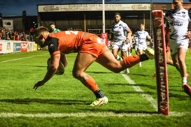 Greg Eden goes over in the corner to open the scoring for Castleford Tigers. Picture: Simon Hall
