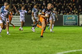 Liam Watts races clear for a try in Castleford Tigers' 32-6 victory over Toulouse Olympique. Picture: Simon Hall