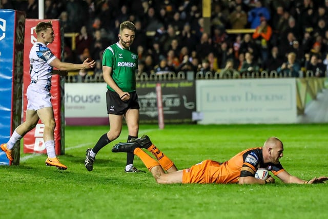 Liam Watts dives over to finish off his solo try a try against Toulouse Olympique. Picture: Simon Hall