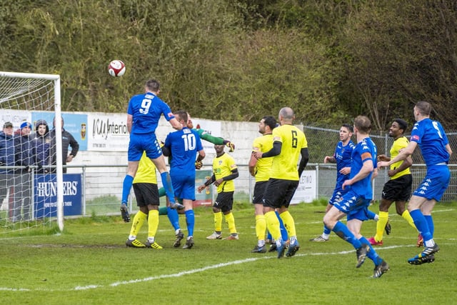 Joe Lumsden climbs to head the ball goalwards for Pontefract Collieries against Yorkshire Amateur.