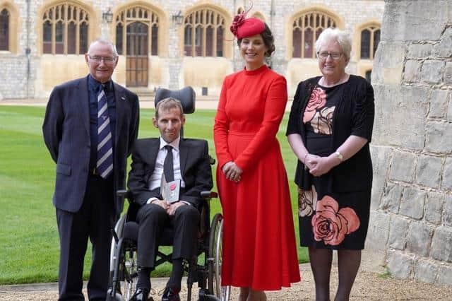 Rob with wife Lindsey, dad Geoff and mum Irene at Windsor Castle. (Photo by Steve Parsons-WPA Pool/Getty Images)
