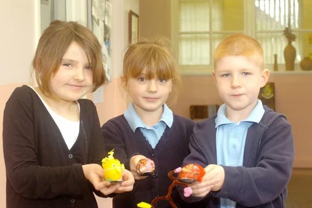 Chelsea Chadwick (9) Lilyrose Ainley (8) and Carl Campbell (7) show their decorated Easter eggs at Fitzwilliam Primary School.