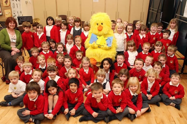Walton Primary School pupils have a story read to them by an Easter Chick in 2008.