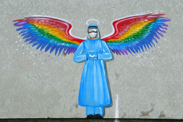 Lifesize image of an NHS work depicted as an angel.