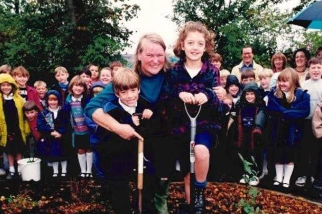 Newton Hill Junior and Infants School, pupils plant rose trees, 1996.