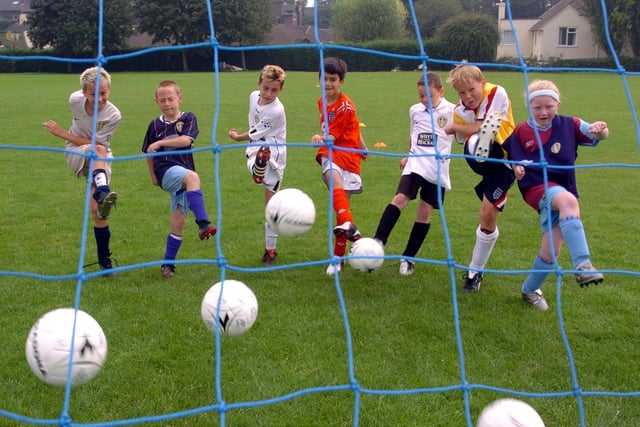 Shooting practice for youngsters at Leeds United's soccer coaching course  at Queen Elizabeth Grammar School, Wakefield.