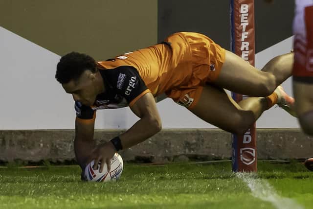 Darrell Olpherts dives over for one of his two tries for Castleford Tigers against St Helens. Picture: Allan McKenzie/SWpix.com
