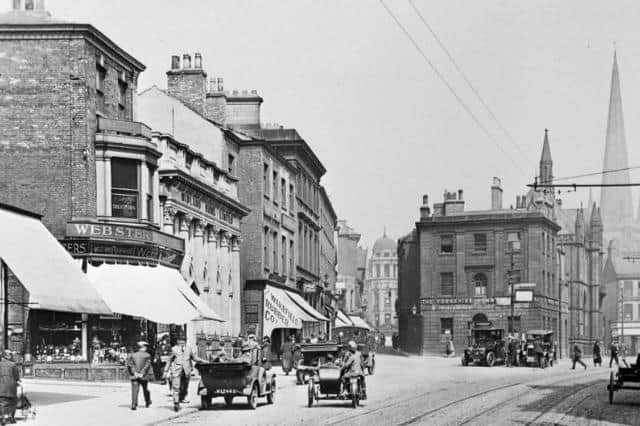 How fantastic is this old photo of Westgate, taken around 1920? Look at the early cars and vans on the road.