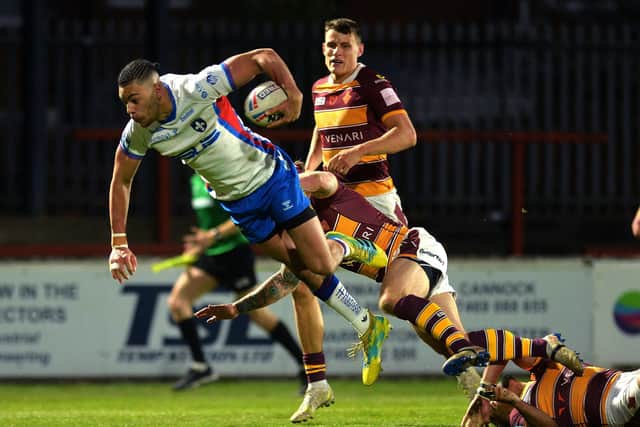 Wakefield
Trinity's Lewis Murphy goes in to score against Huddersfield. Picture: Jonathan Gawthorpe.