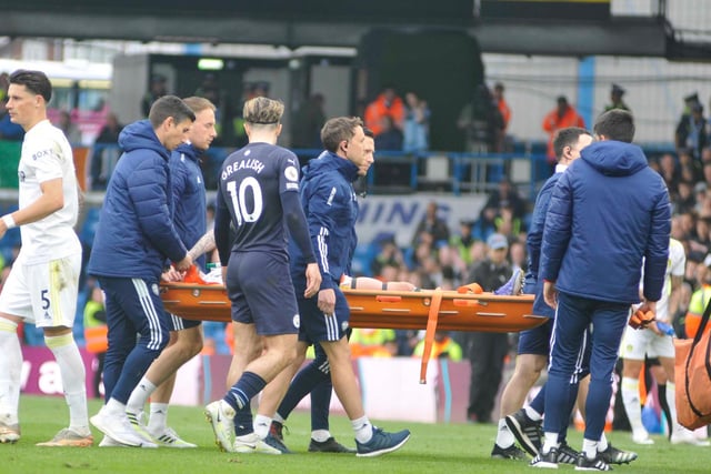 Stuart Dallas, an ever present for Leeds United in the Premiership, is stretchered off injured.