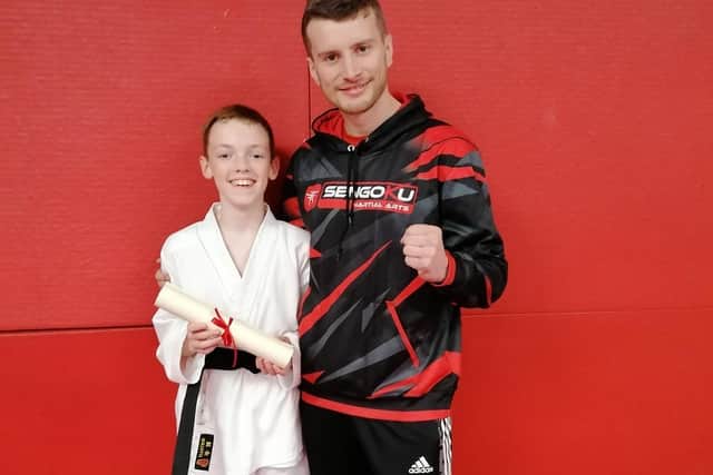 Edward Lee with his karate instructor Sensei Ty.