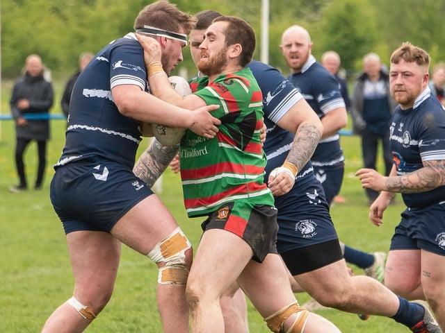 Crunch time as Featherstone Lions' Leo Brown wraps up West Bowling's Ollie Bartle. Picture: Jonathan Buck
