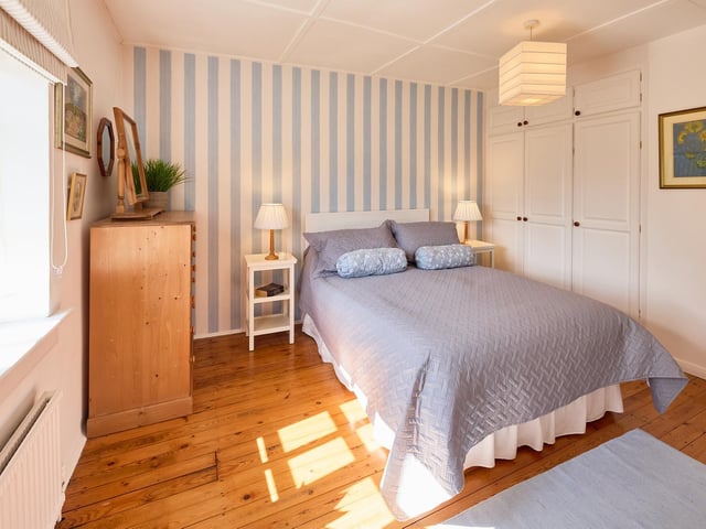 Another of the pretty bedrooms within Rose Cottage.