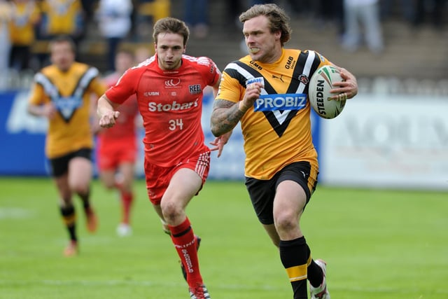 Nick Youngquest races away towards one of his three tries in Castleford Tigers' 36-12 win over Widnes Vikings.