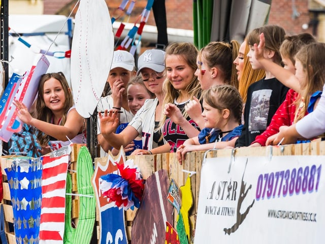 A Star Dance and Fitness wave to the crowds.